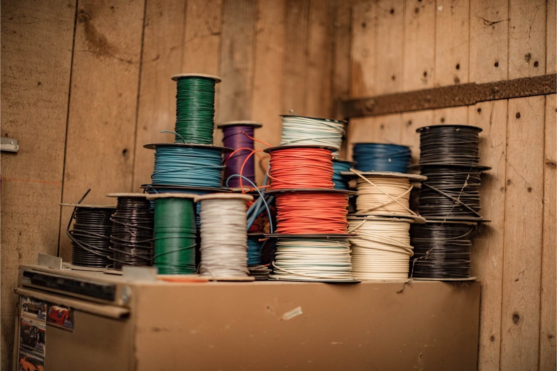Electrical wires on a spindel in storage room