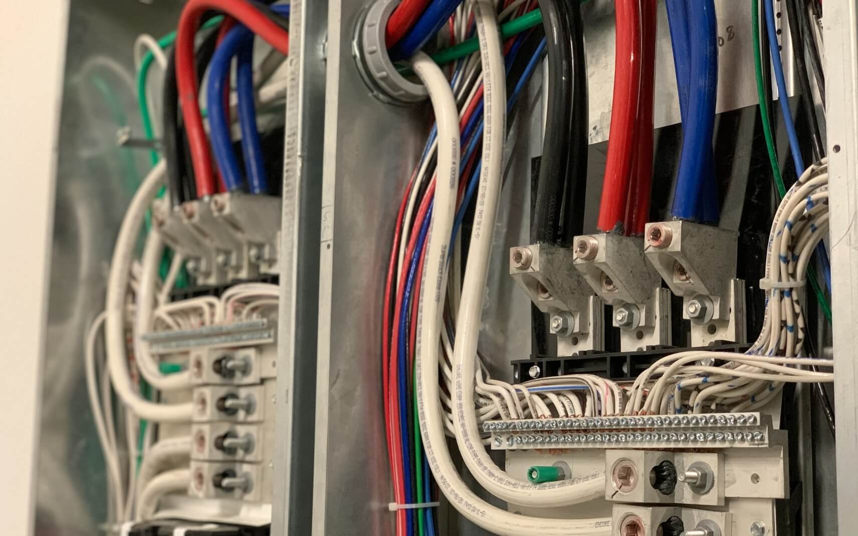 Completed electrical panel with neat wiring built to inspection standards